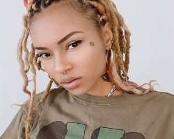 She has a total of eleven piercing including one in the nasal septum and both sides of the nose. She also has four piercing in each on her ears.